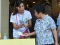 关爱妇女儿童 尚义社工赤坎街头宣传公益活动