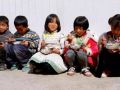 中国扶贫基金会携手NU SKIN 探访蜜儿餐项目学校